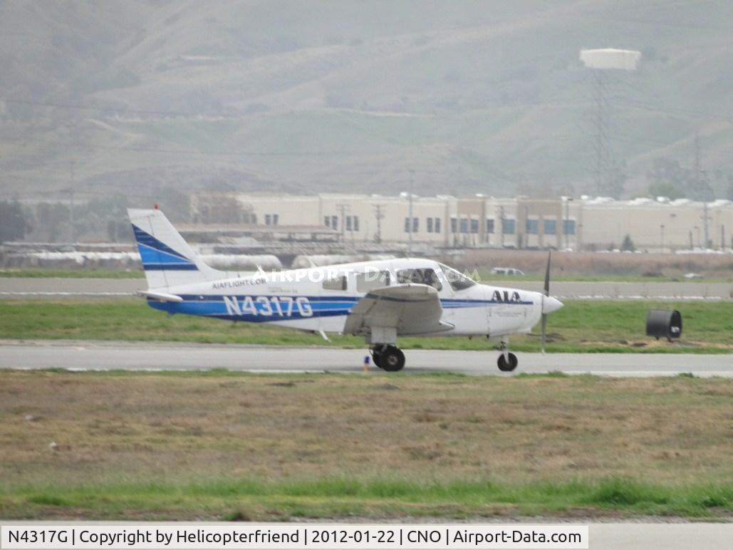 N4317G, 1983 Piper PA-28-161 C/N 28-8416003, Rolling out after landing on runway 26R