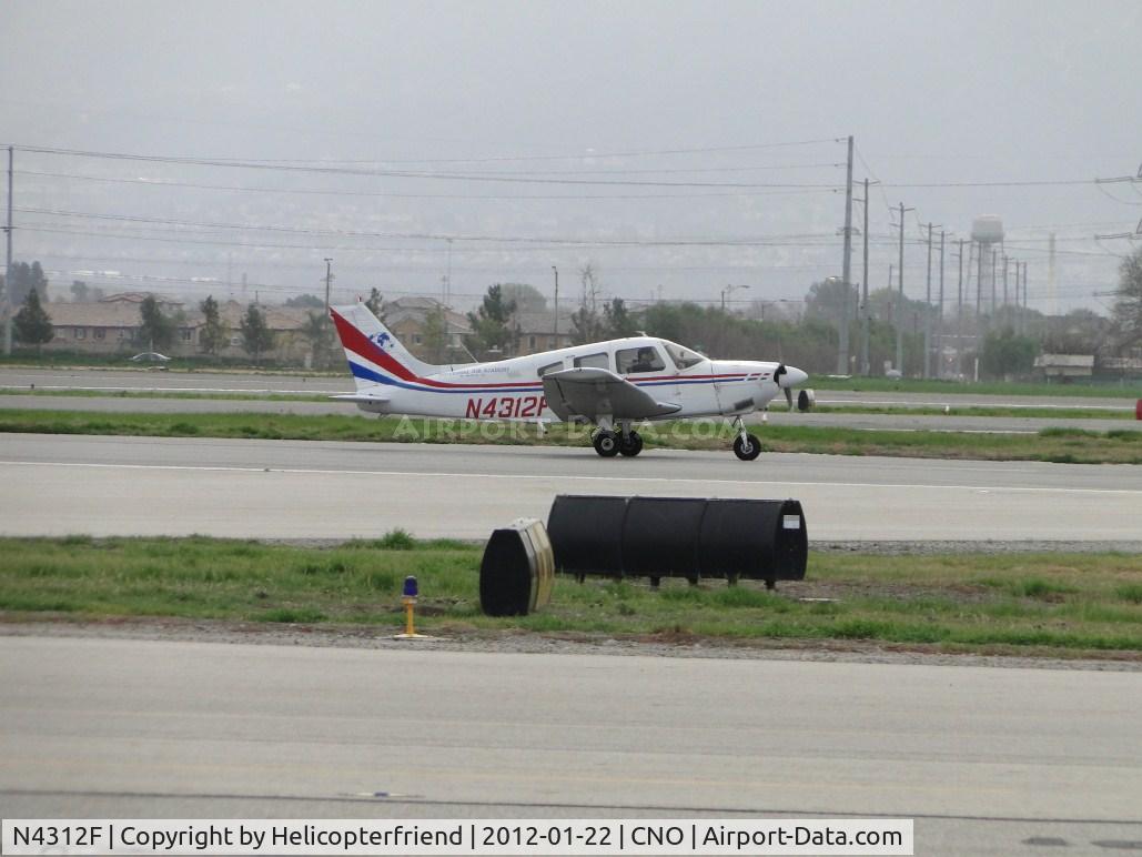N4312F, 1977 Piper PA-28-181 Archer II C/N 287790010, Rolling out after landing