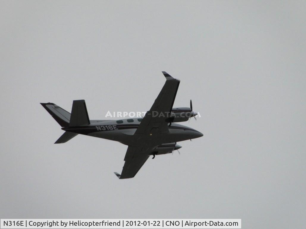 N316E, 1980 Beech B-60 Duke C/N P-550, Fly over runway 26R and turning southbound