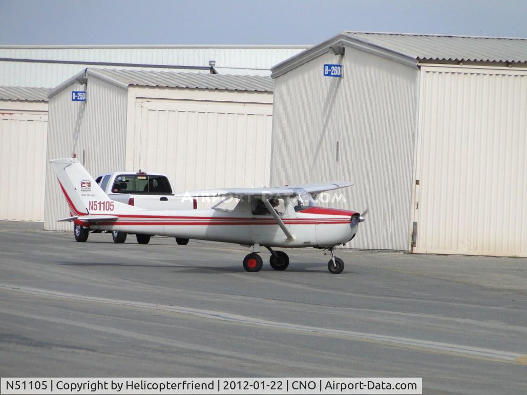 N51105, 1968 Cessna 150J C/N 15069769, Taxiing between the hangers, with 2 other ships heading towards runway 26