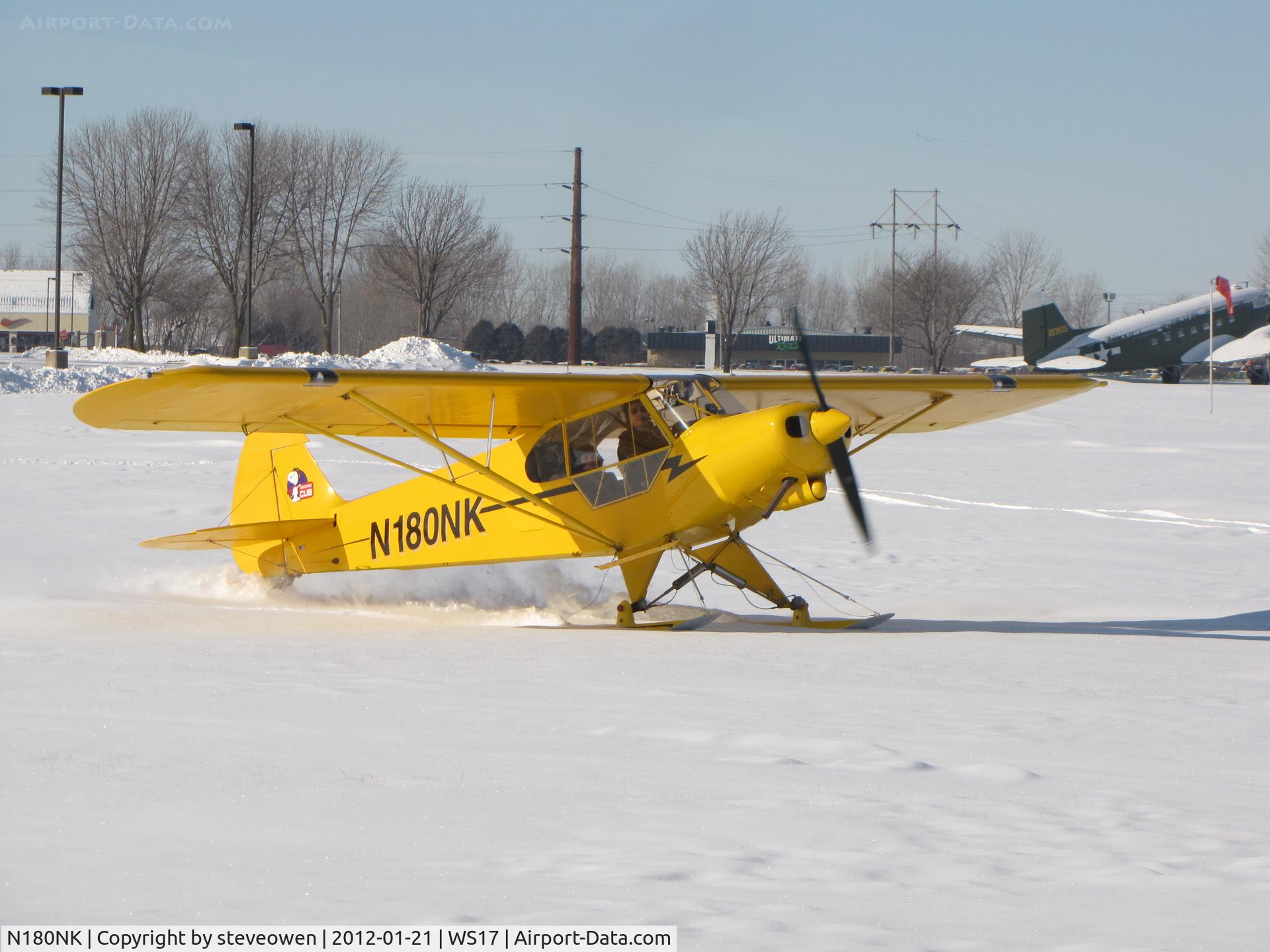 N180NK, 2008 Piper Cub Replica C/N 062, Taxing into Pioneer airport on skies