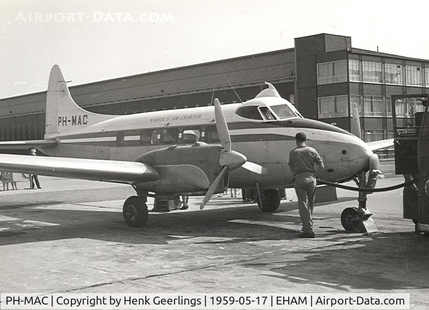 PH-MAC, 1947 De Havilland DH-104 Dove 1 C/N 04020, Martin's Air Charter. Refueling for next sightseeing flight