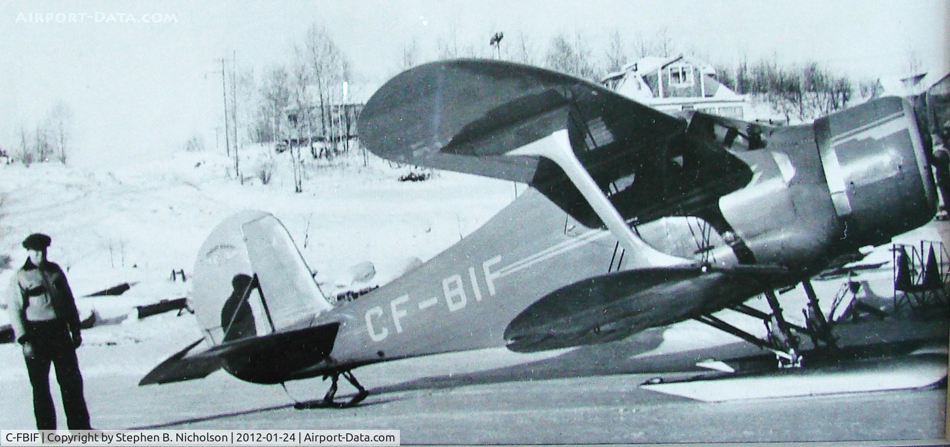C-FBIF, 1937 Beech D17S Staggerwing C/N 120, Don Starratt beside his company's Staggerwing at the foot of 5th Ave in Sioux Lookout, Ontario. Date unknown. Photo courtesy of Don Starratt.