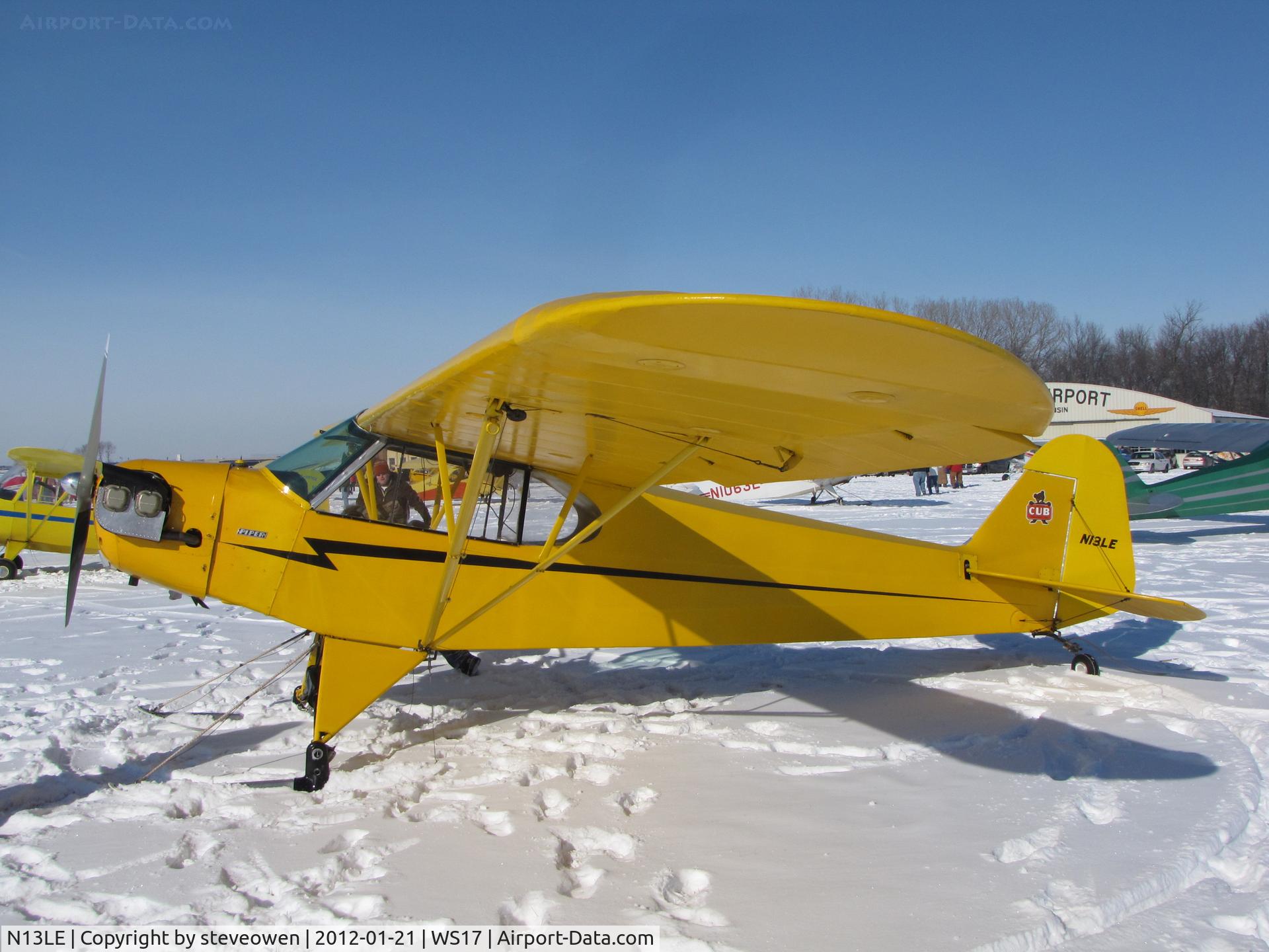 N13LE, Piper J3C-65 Cub Cub C/N 17571, Bright snow and skis make for a good day of fun