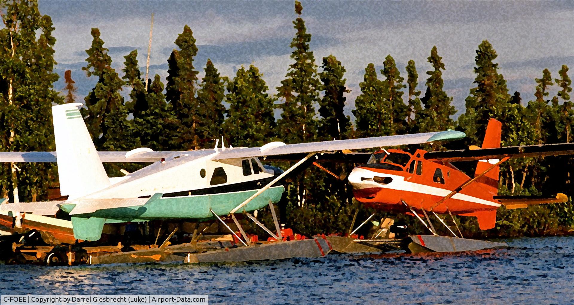C-FOEE, 1965 De Havilland Canada DHC-2 Turbo Beaver Mk.3 C/N 1598TB10, sister turbo beavers c-foef and c-foee at Hatchet Lake dock in northern Sask.