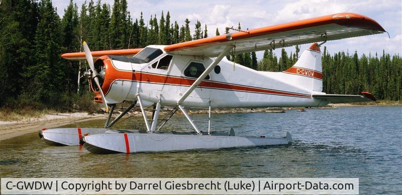 C-GWDW, 1953 De Havilland Canada U-6A Beaver C/N 306/1118, C-GWDW on shores of Wollaston Lake, SK in the early 80's. Wollaston Lake Air had it here for a number of years