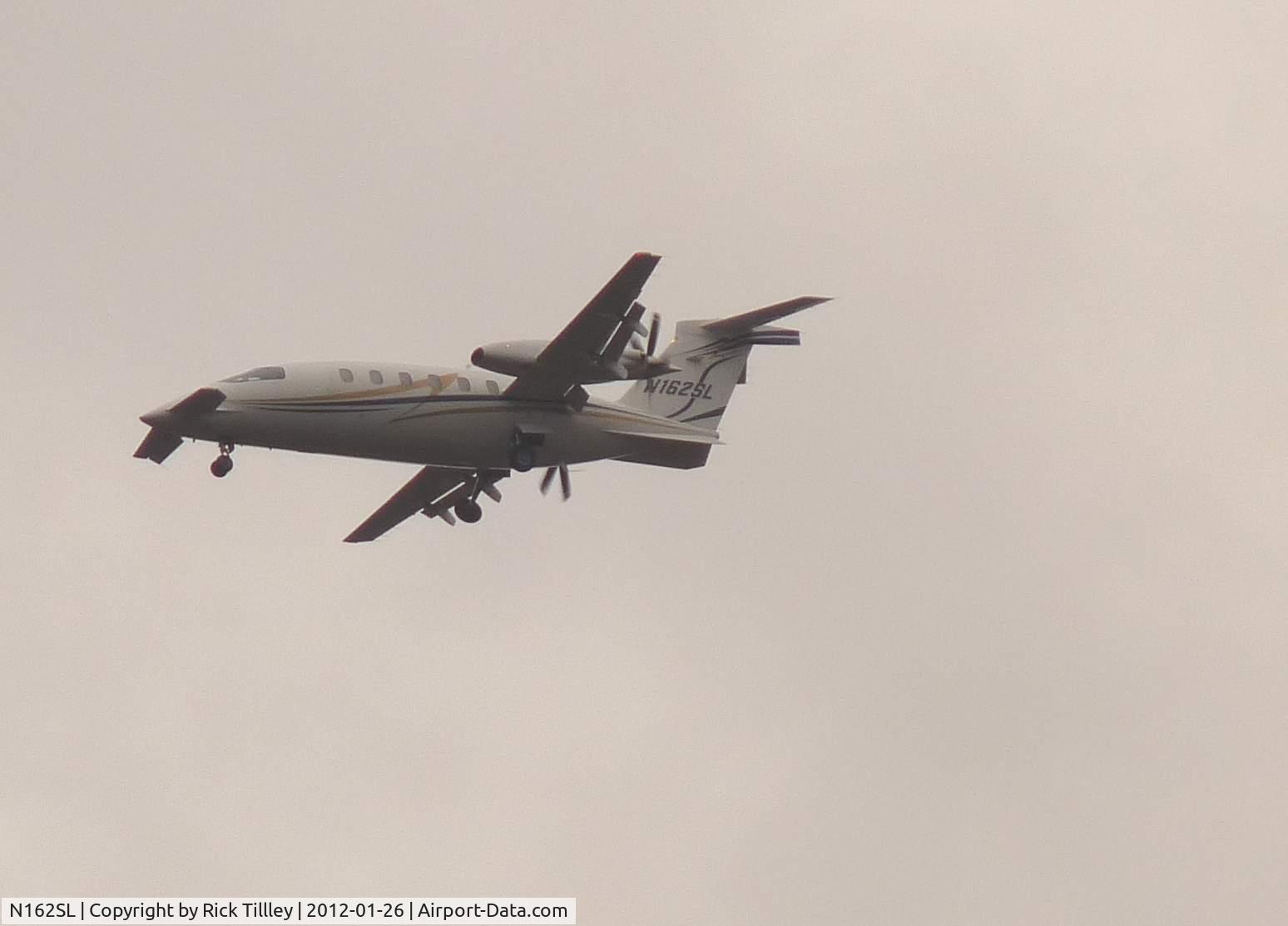 N162SL, 2007 Piaggio P-180 C/N 1130, On aproach to mccollom field, kennesaw , ga. Dull, cloudy day.