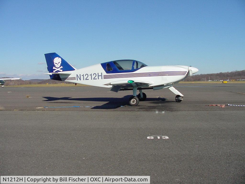 N1212H, 1993 Stoddard-Hamilton Glasair I FT C/N 693, The tail design was copied from Navy aircraft . I descovered to my surprise that some people were afraid to fly in a airplane with skull and bones on the tail .