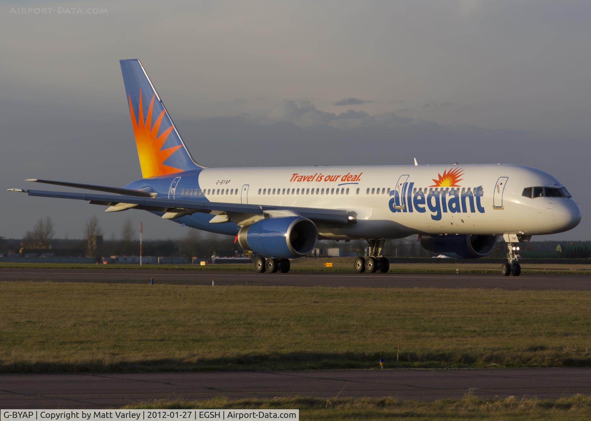 G-BYAP, 1994 Boeing 757-204 C/N 27236, Fresh out of spray in Allegiant Air C/S(N906NV),about to depart in the late evening sun.