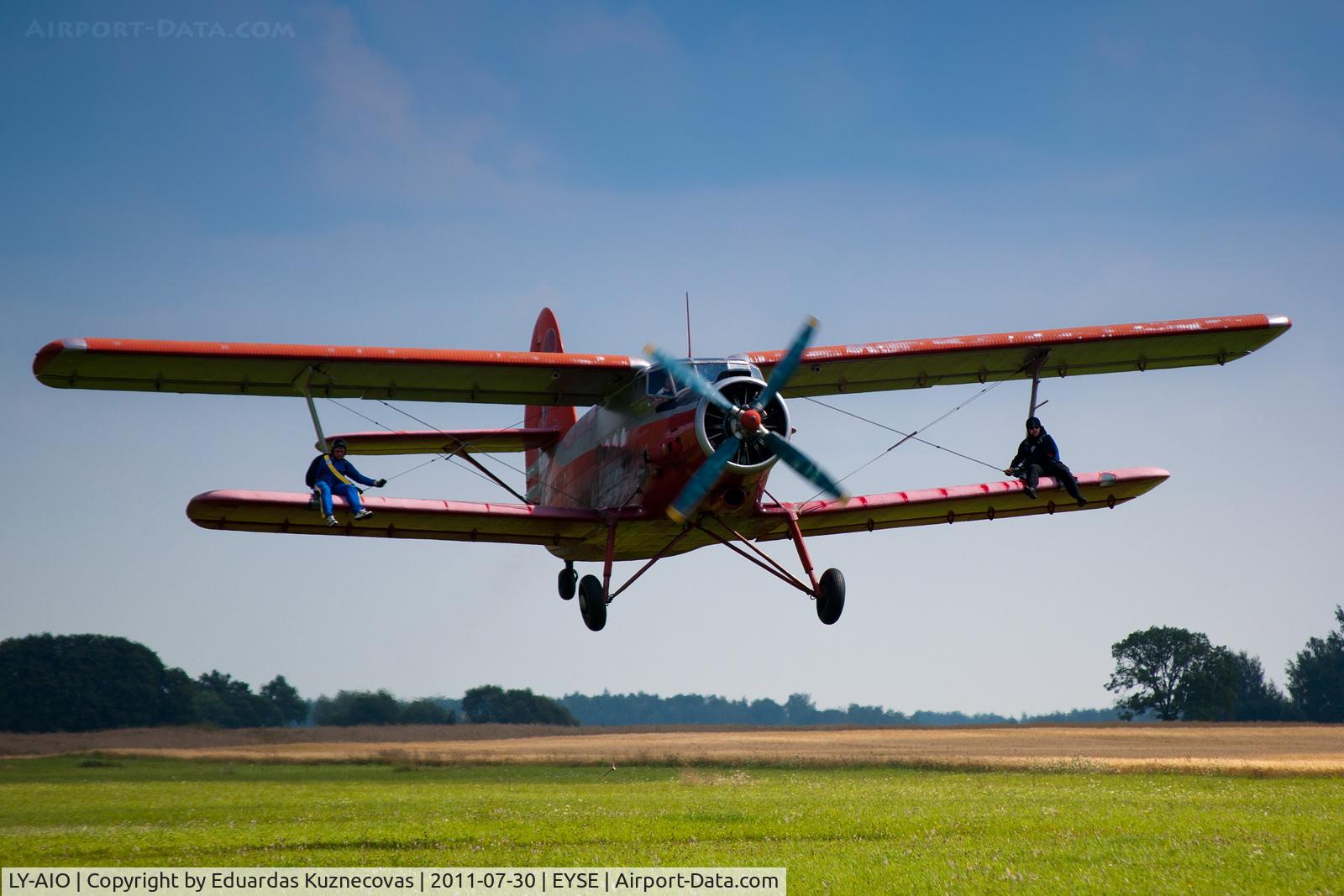 LY-AIO, Antonov An-2T C/N 1G160-43, The guy on the left wing is celebrating 200th jump just like this - jumping from the wing!