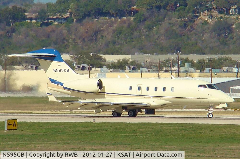 N595CB, Bombardier Challenger 300 (BD-100-1A10) C/N 20326, Exiting 12R