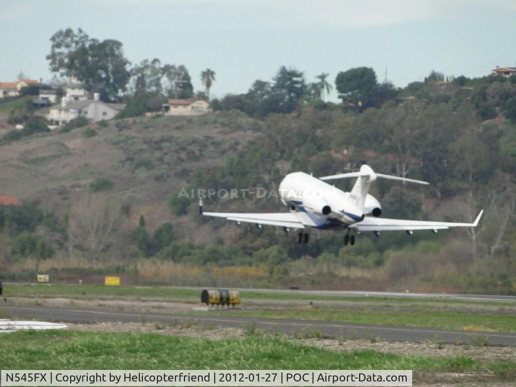 N545FX, 2010 Bombardier Challenger 300 (BD-100-1A10) C/N 20302, Airbourne heading westbound