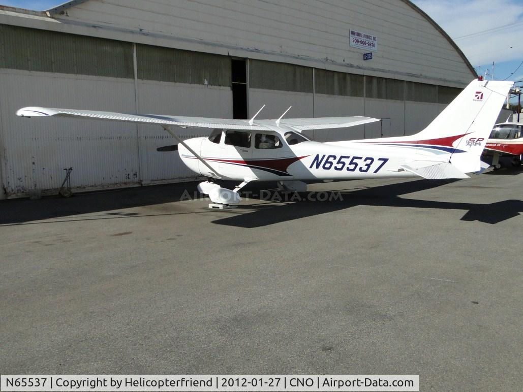 N65537, 2004 Cessna 172S C/N 172S9726, Parked next to a hanger