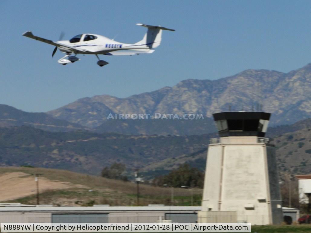N888YW, 2006 Diamond DA-40 Diamond Star C/N 40.689, Climbing out as she passes the tower