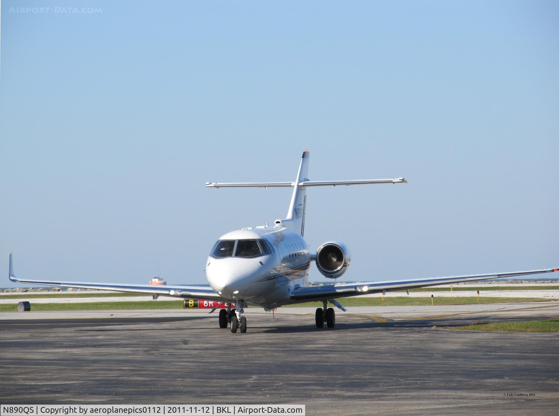 N890QS, 2007 Hawker Beechcraft Hawker 900XP C/N HA-0010, N890QS, seen pulling off of BKL's Runway 6L.