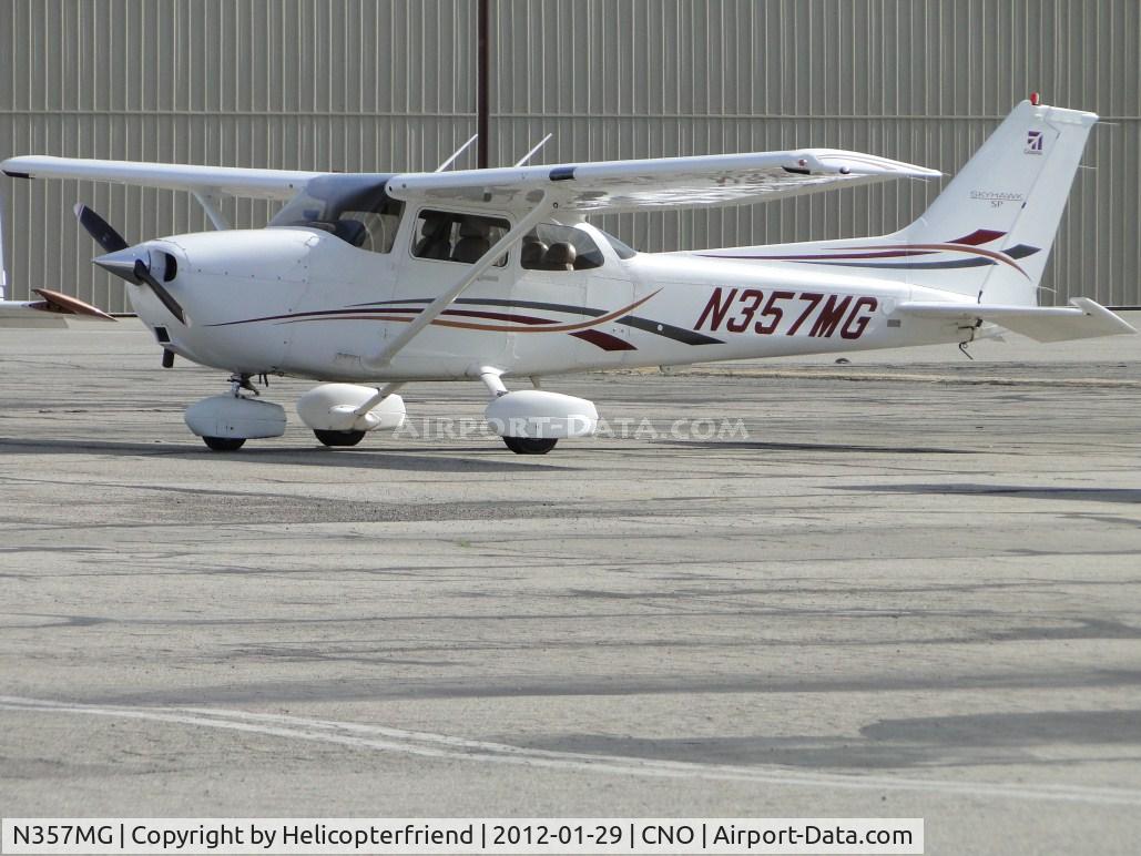 N357MG, 2006 Cessna 172S C/N 172S10259, Parked south of the paint shop