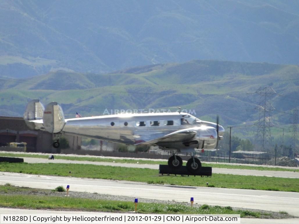 N1828D, 1952 Beech D18S C/N A-837, Taking off from runway 26R