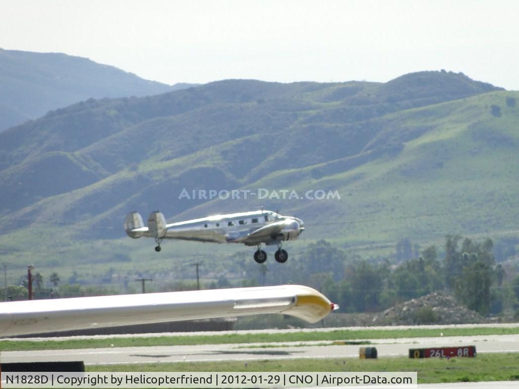 N1828D, 1952 Beech D18S C/N A-837, Completed a touch & go and is climbing out