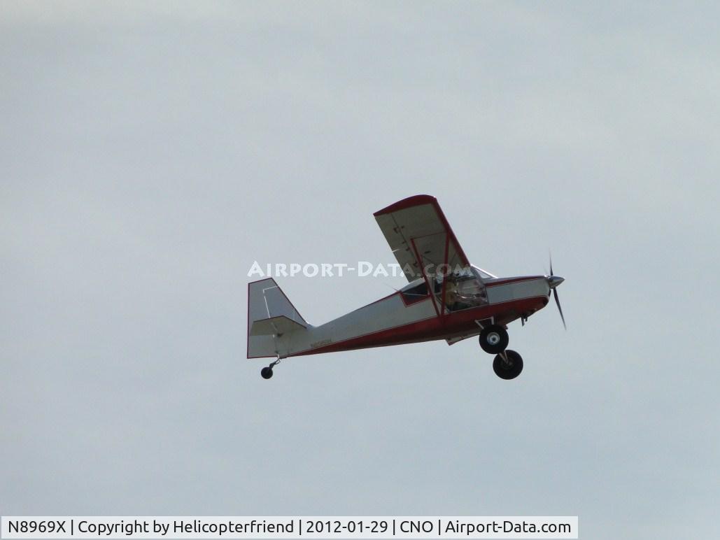 N8969X, 2009 Just Aircraft Highlander C/N JAESC0155, Flying by over runway 26R
