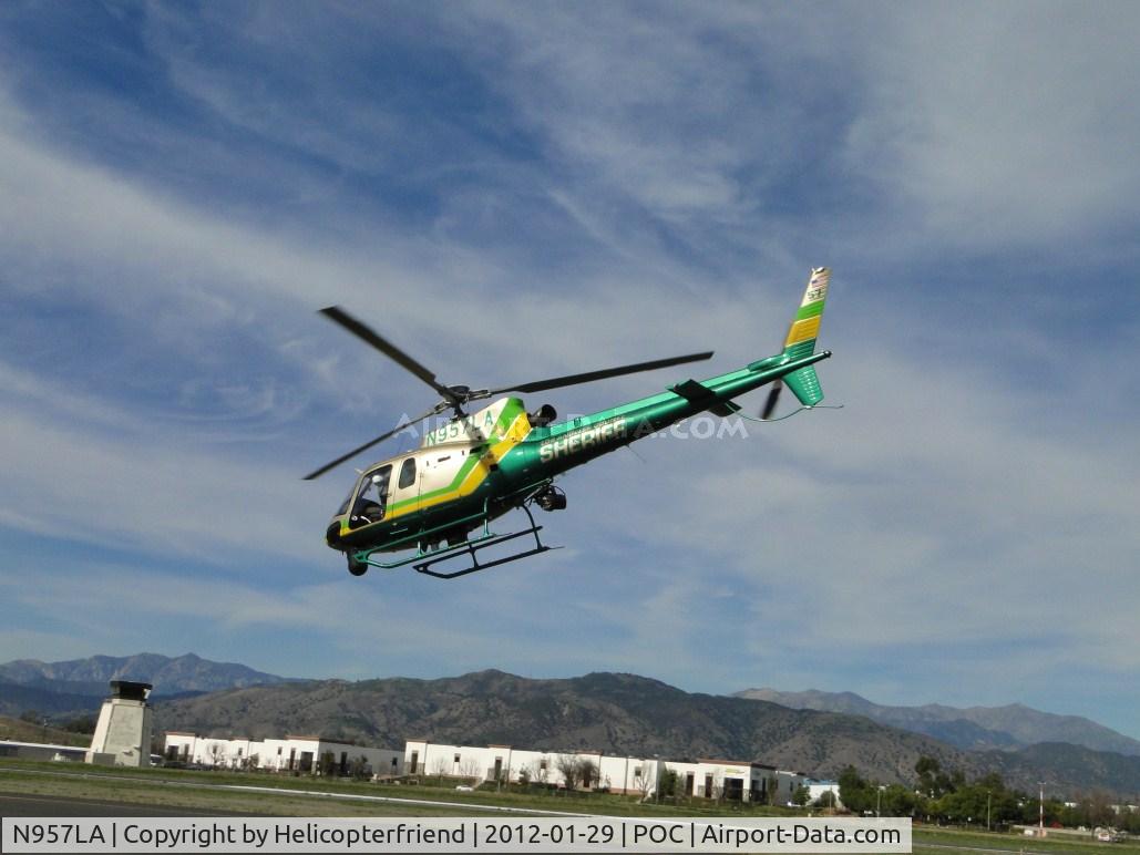 N957LA, 2010 Eurocopter AS-350B-2 Ecureuil Ecureuil C/N 7072, Gaining speed for a westerly lift off