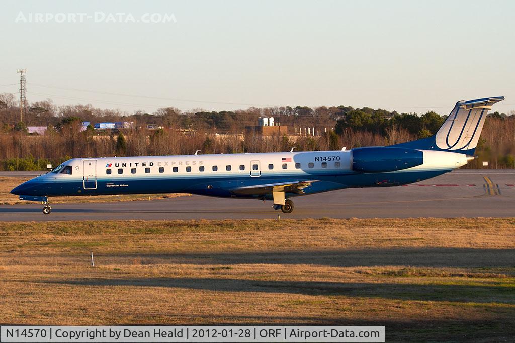 N14570, 2002 Embraer ERJ-145LR (EMB-145LR) C/N 145632, United Express (ExpressJet Airlines) N14570 (FLT ASQ4401) taxiing to RWY 23 on taxiway Charlie for departure to Newark Liberty Int'l (KEWR).
