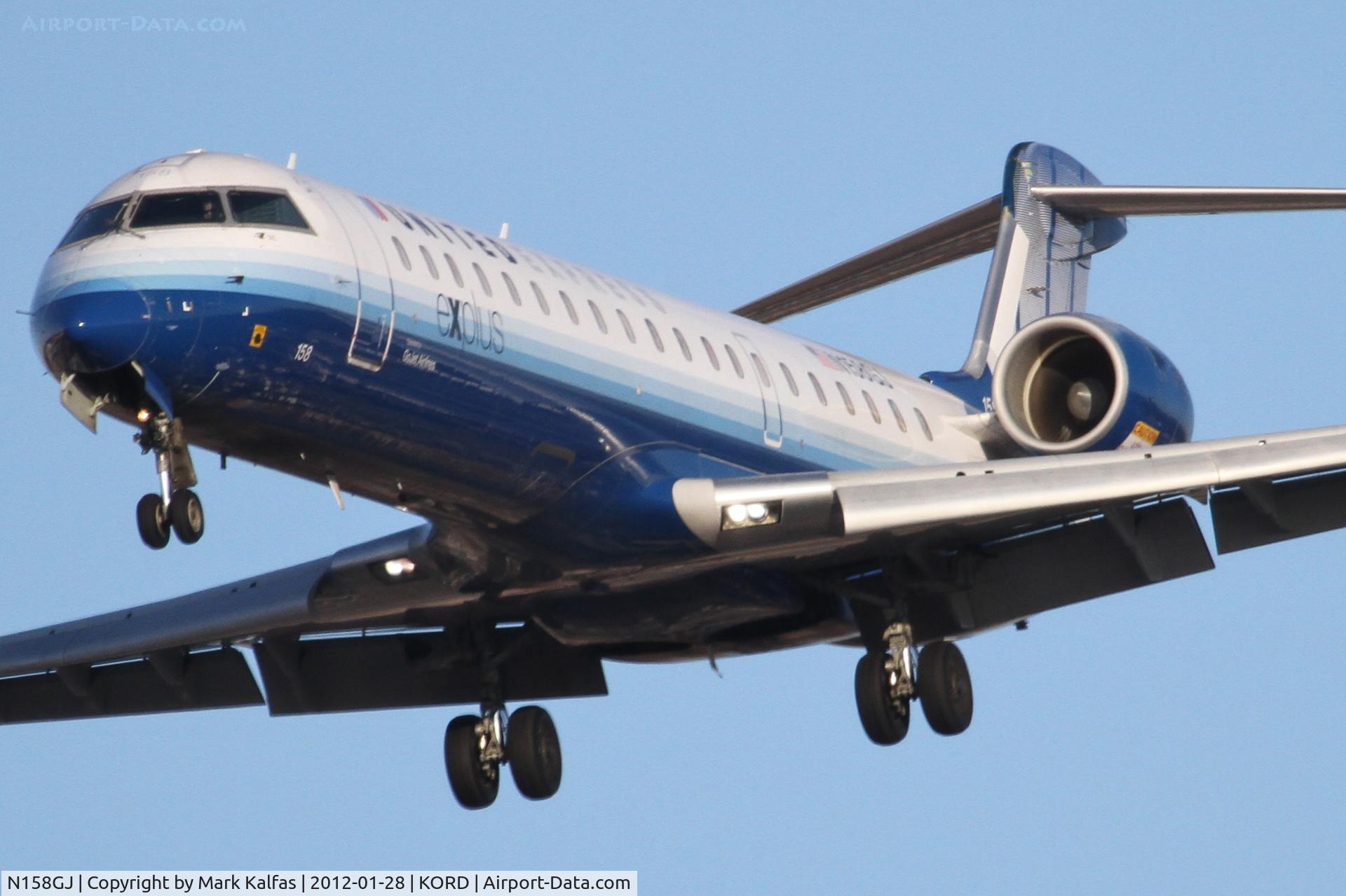 N158GJ, 2005 Bombardier CRJ-702 (CL-600-2C10) Regional Jet C/N 10237, GoJet/United Express Bombardier CL-600-2C10, ASQ5176 arriving from KDTW, RWY 28 approach KORD.