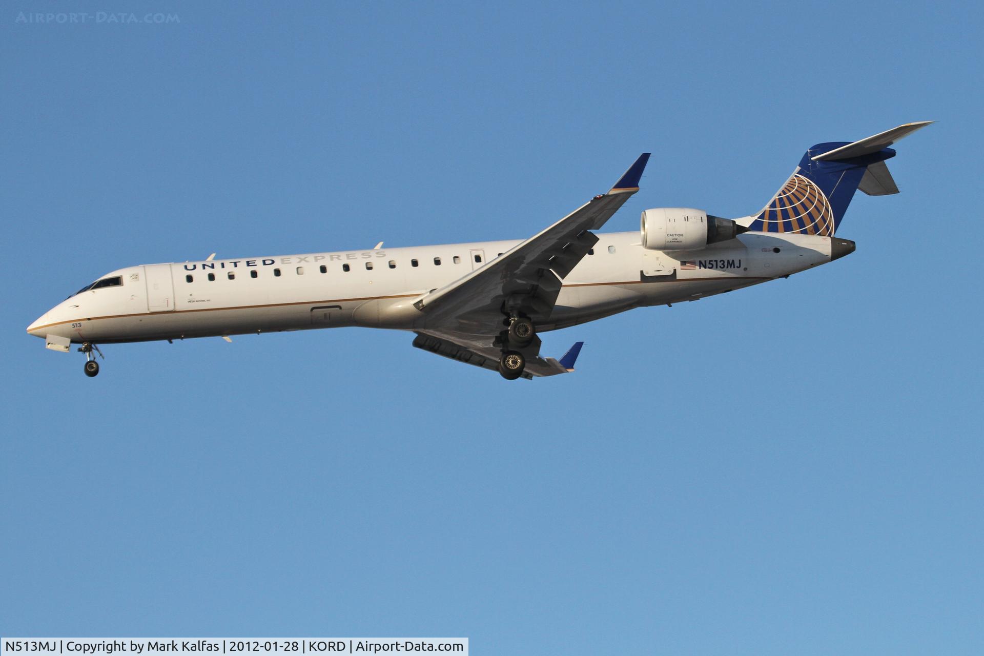 N513MJ, 2003 Bombardier CRJ-701 (CL-600-2C10) Regional Jet C/N 10111, Mesa Airlines/United Express Bombardier CL-600-2C10, ASH3760 arriving from KMCI RWY 28 approach KORD.