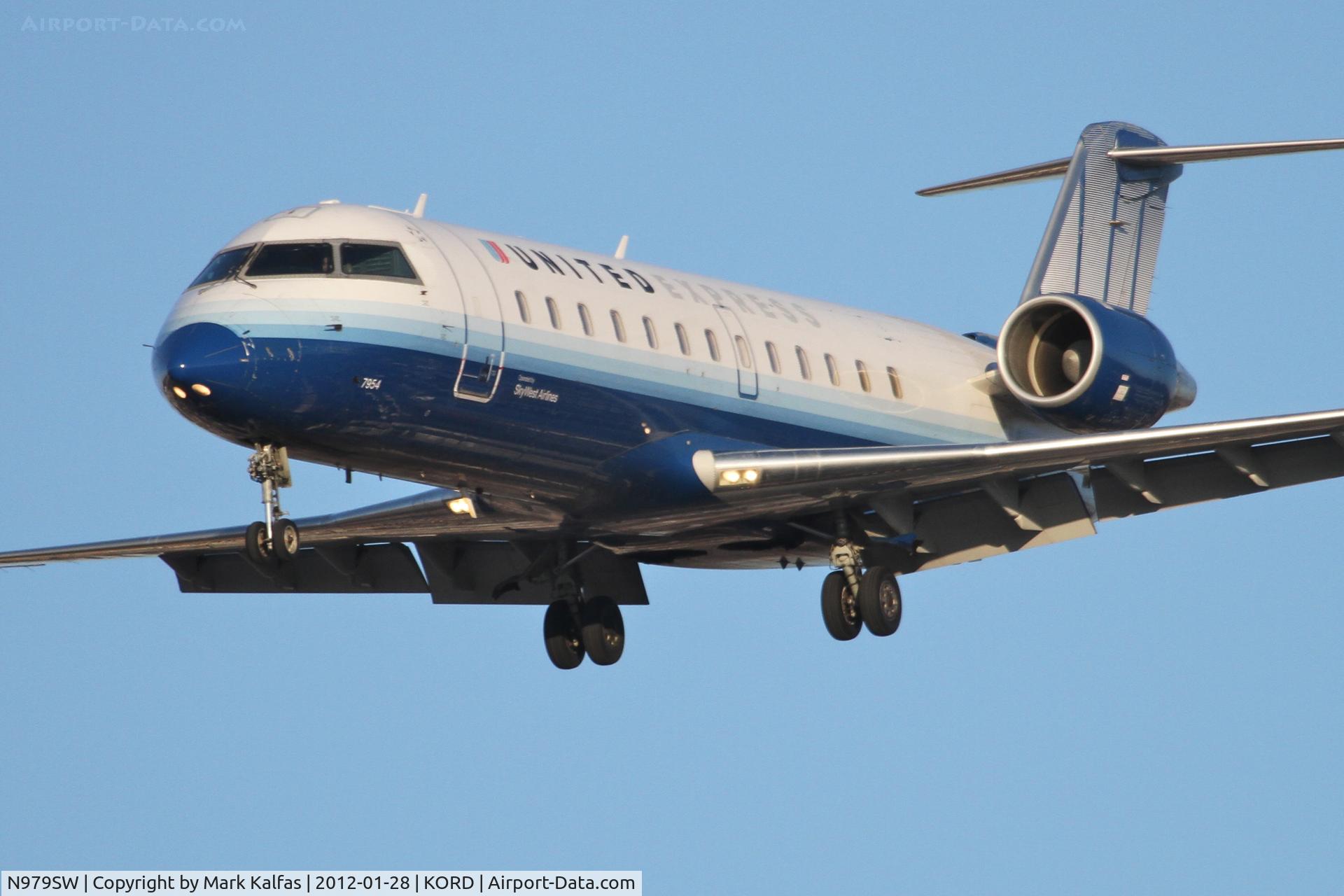 N979SW, 2004 Bombardier CRJ-200ER (CL-600-2B19) C/N 7954, SkyWest/United Express Bombardier CL-600-2B19, SKW6331 arriving from Nashville - KBNA, RWY 28 approach KORD.