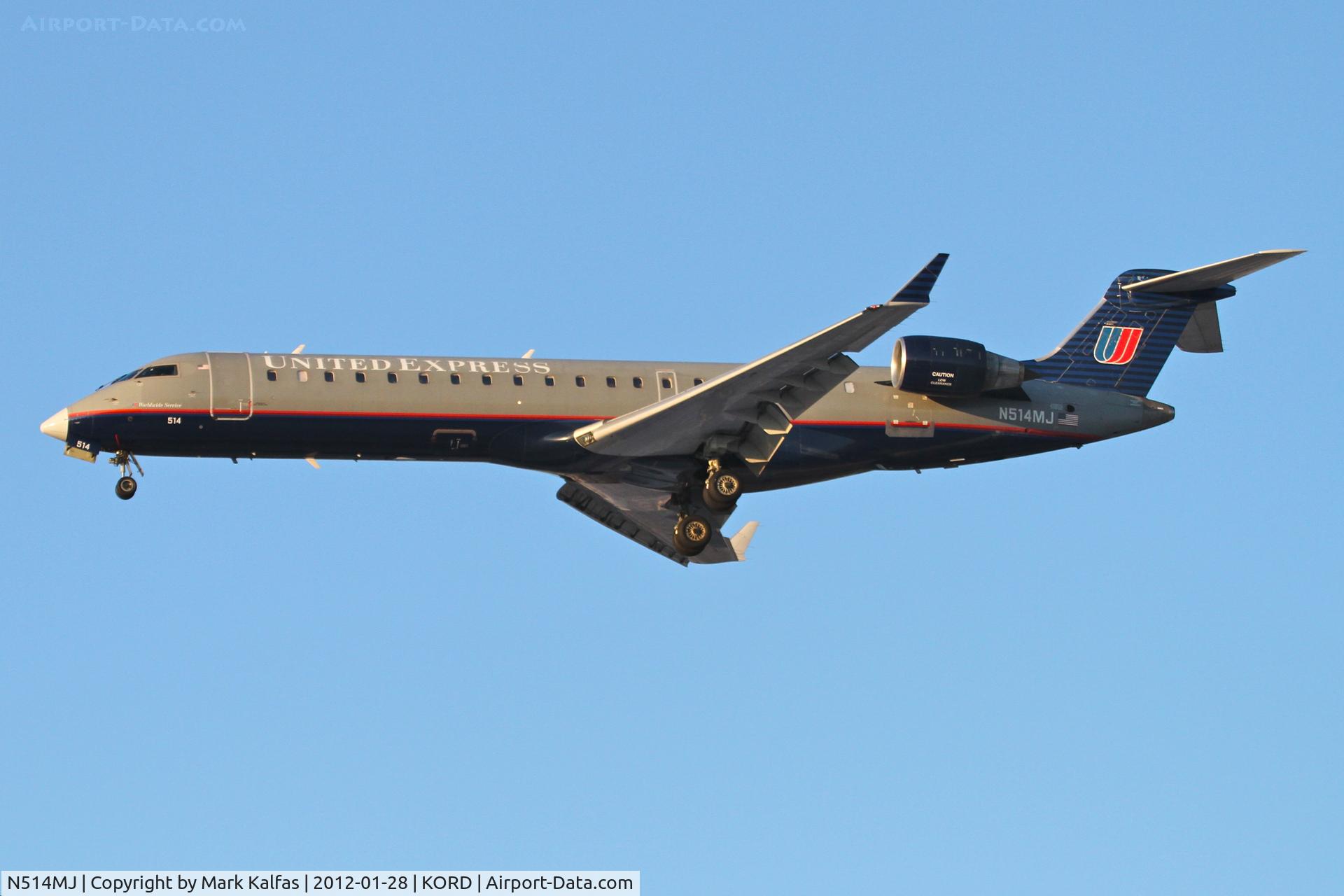 N514MJ, 2003 Bombardier CRJ-700 (CL-600-2C10) Regional Jet C/N 10116, Mesa Airlines/United Express Bombardier CL-600-2C10, ASH3729 arriving from KELP, RWY 28 approach KORD. 