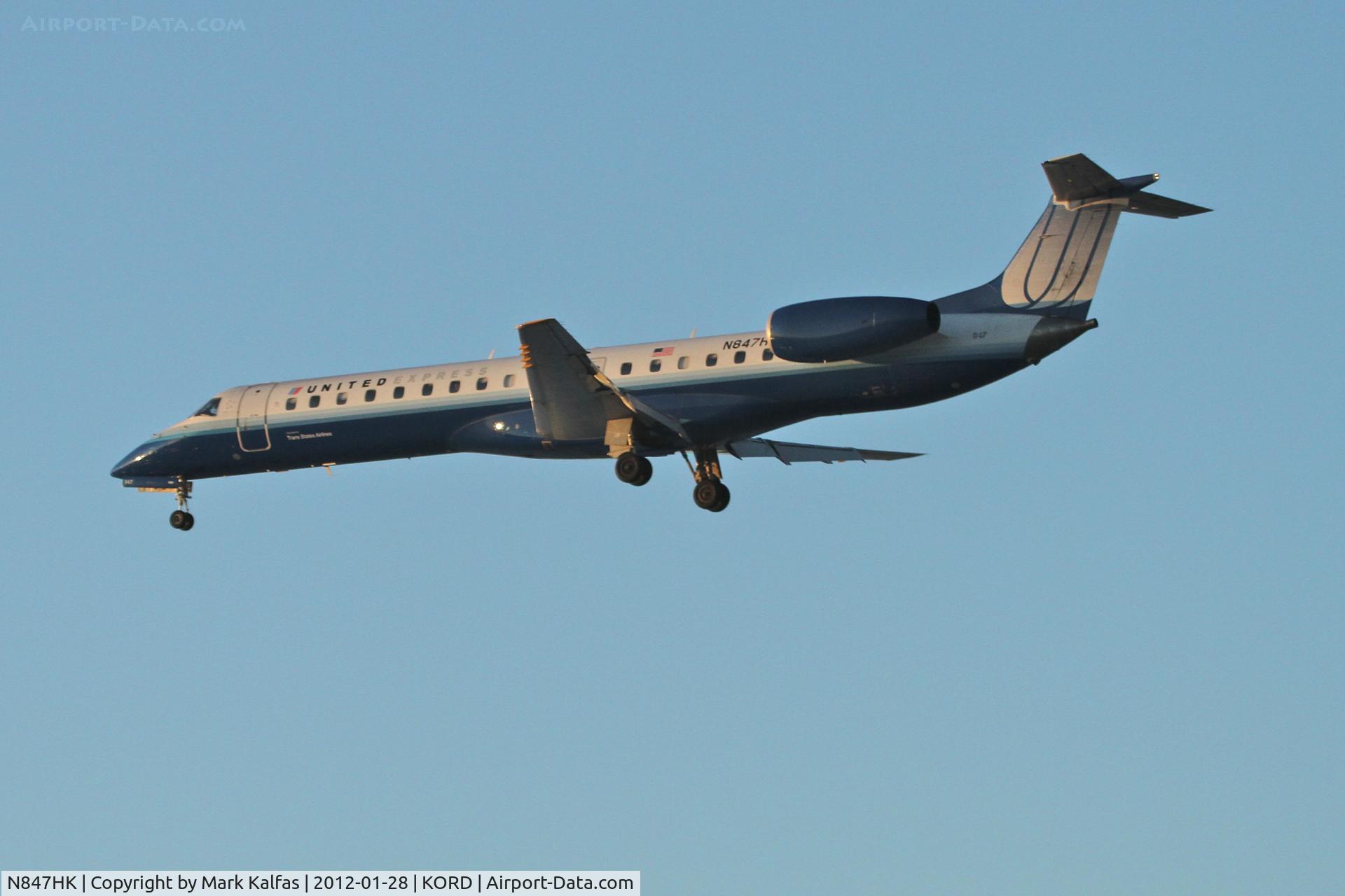 N847HK, 2004 Embraer ERJ-145LR (EMB-145LR) C/N 14500857, Trans States/United Express Embraer EMB-145, LOF3337 arriving from KOKC , RWY 28 approach KORD.