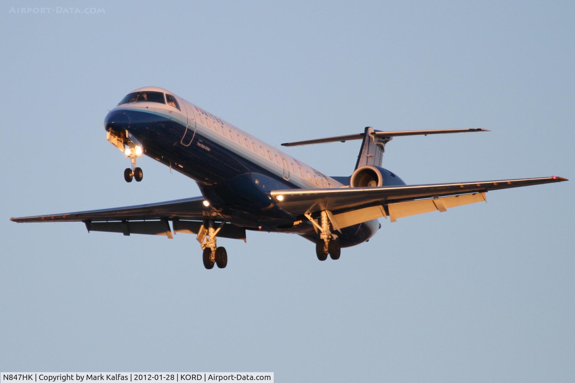 N847HK, 2004 Embraer ERJ-145LR (EMB-145LR) C/N 14500857, Trans States/United Express Embraer EMB-145, LOF3337 arriving from KOKC , RWY 28 approach KORD.