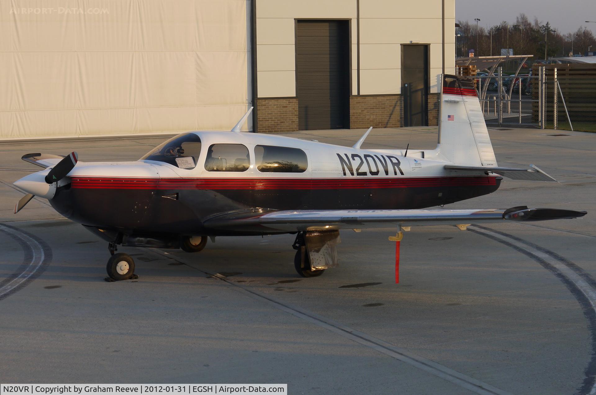 N20VR, 1997 Mooney M20K C/N 25-2016, Parked in the late afternoon sun.