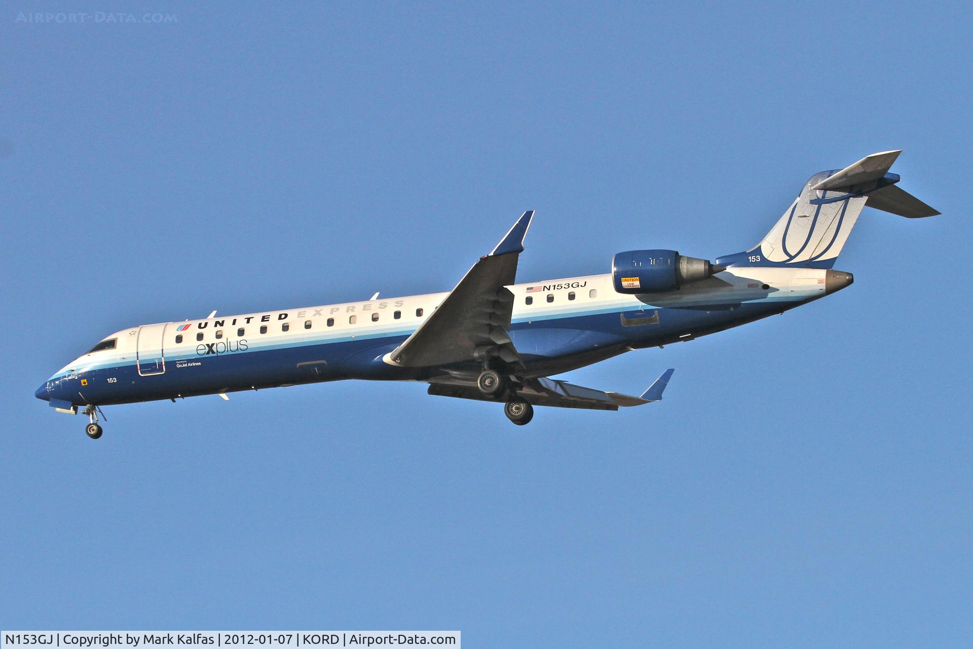 N153GJ, 2005 Bombardier CRJ-702 (CL-600-2C10) Regional Jet C/N 10219, GoJet/United Express Bombardier CL-600-2C10 on approach RWY 28 KORD.