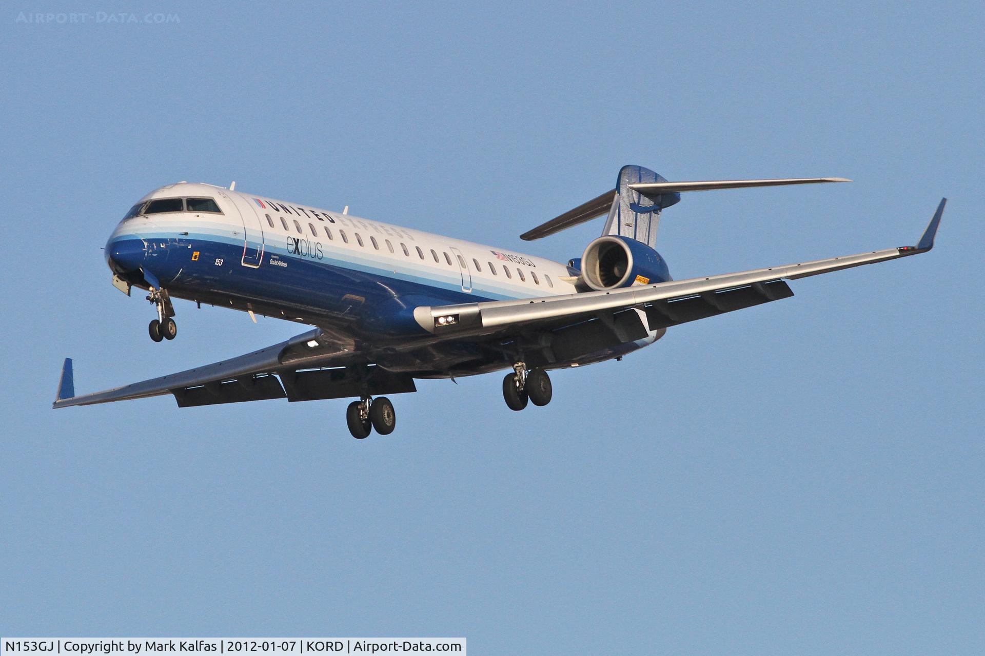 N153GJ, 2005 Bombardier CRJ-702 (CL-600-2C10) Regional Jet C/N 10219, GoJet/United Express Bombardier CL-600-2C10 on approach RWY 28 KORD.