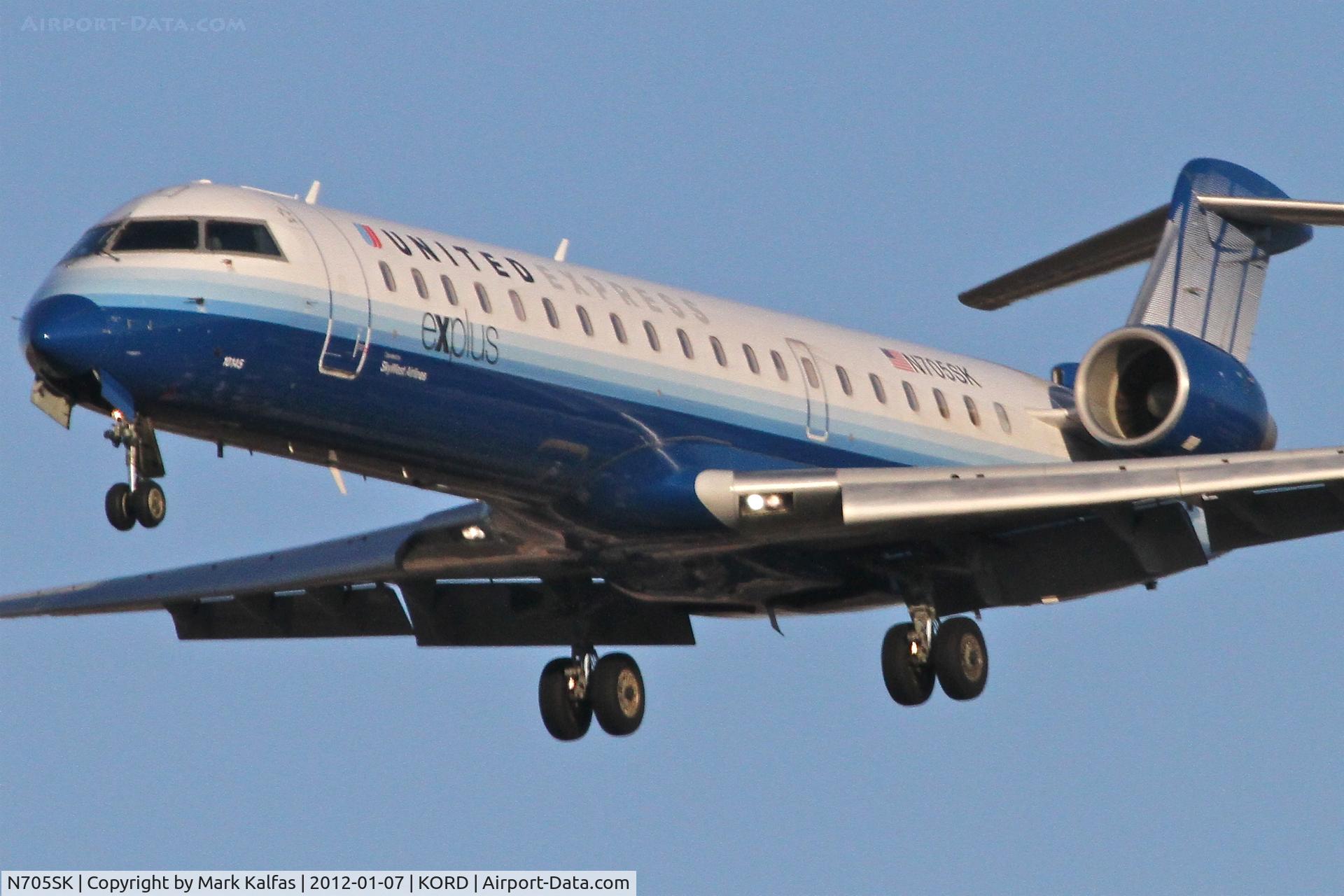 N705SK, 2004 Bombardier CRJ-701 (CL-600-2C10) Regional Jet C/N 10145, SkyWest Bombardier CL-600-2C10 RWY 28 approach KORD.