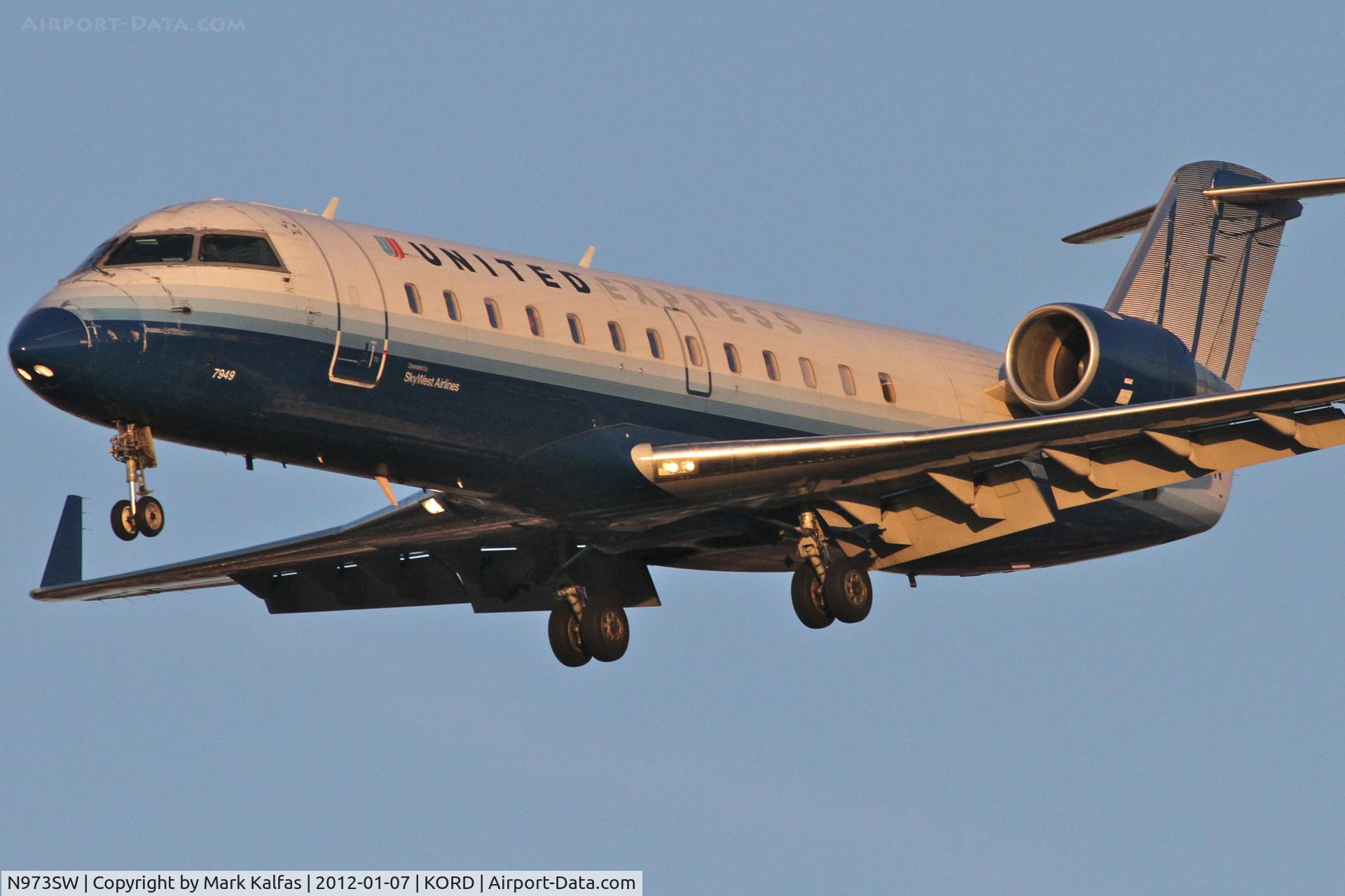 N973SW, 2004 Bombardier CRJ-200ER (CL-600-2B19) C/N 7949, SkyWest/United Express N973SW Bombardier CL-600-2B19 RWY 28 approach KORD.