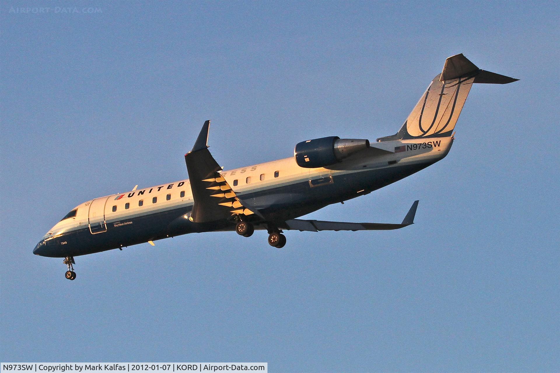 N973SW, 2004 Bombardier CRJ-200ER (CL-600-2B19) C/N 7949, SkyWest/United Express N973SW Bombardier CL-600-2B19 RWY 28 approach KORD.