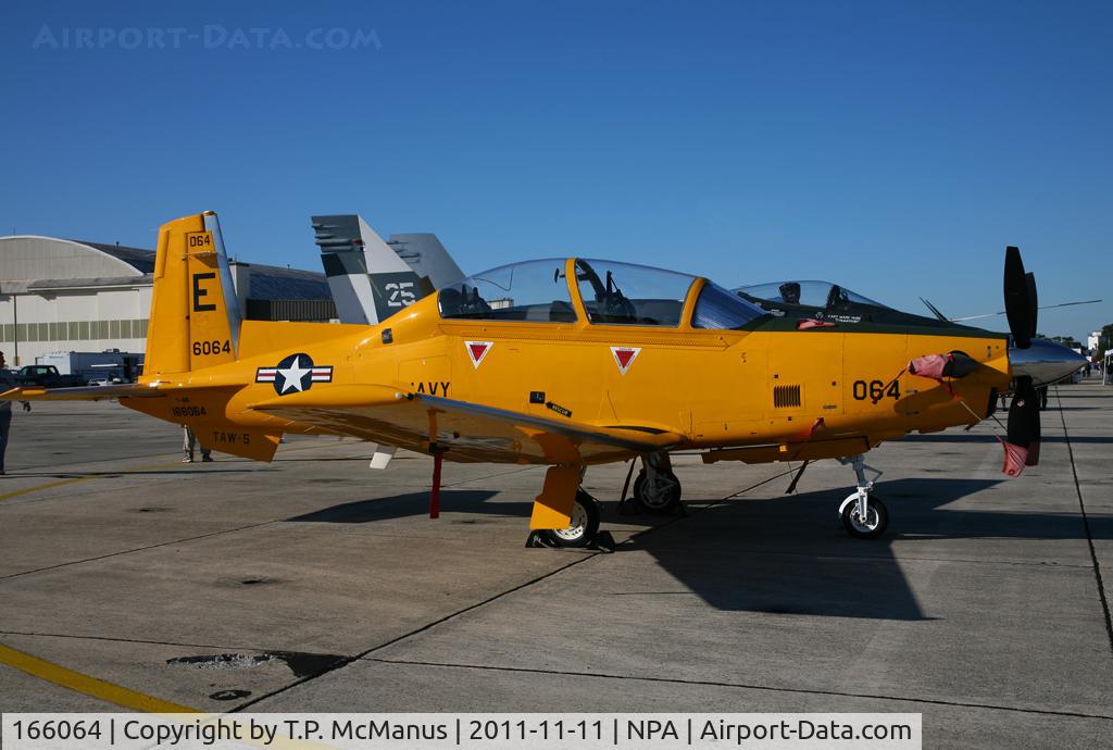 166064, Raytheon T-6B Texan II C/N PN-55, Displaying the markings of TAW-5, parked on the ramp at NPA.