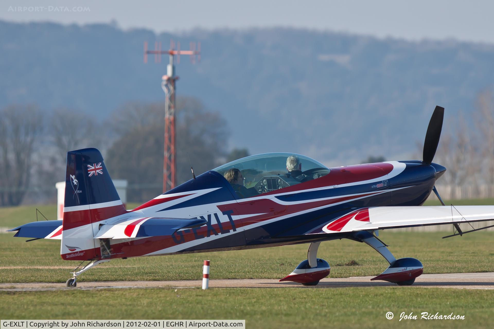 G-EXLT, 2011 Extra EA-300LT C/N 40650E, At the refuelling pumps