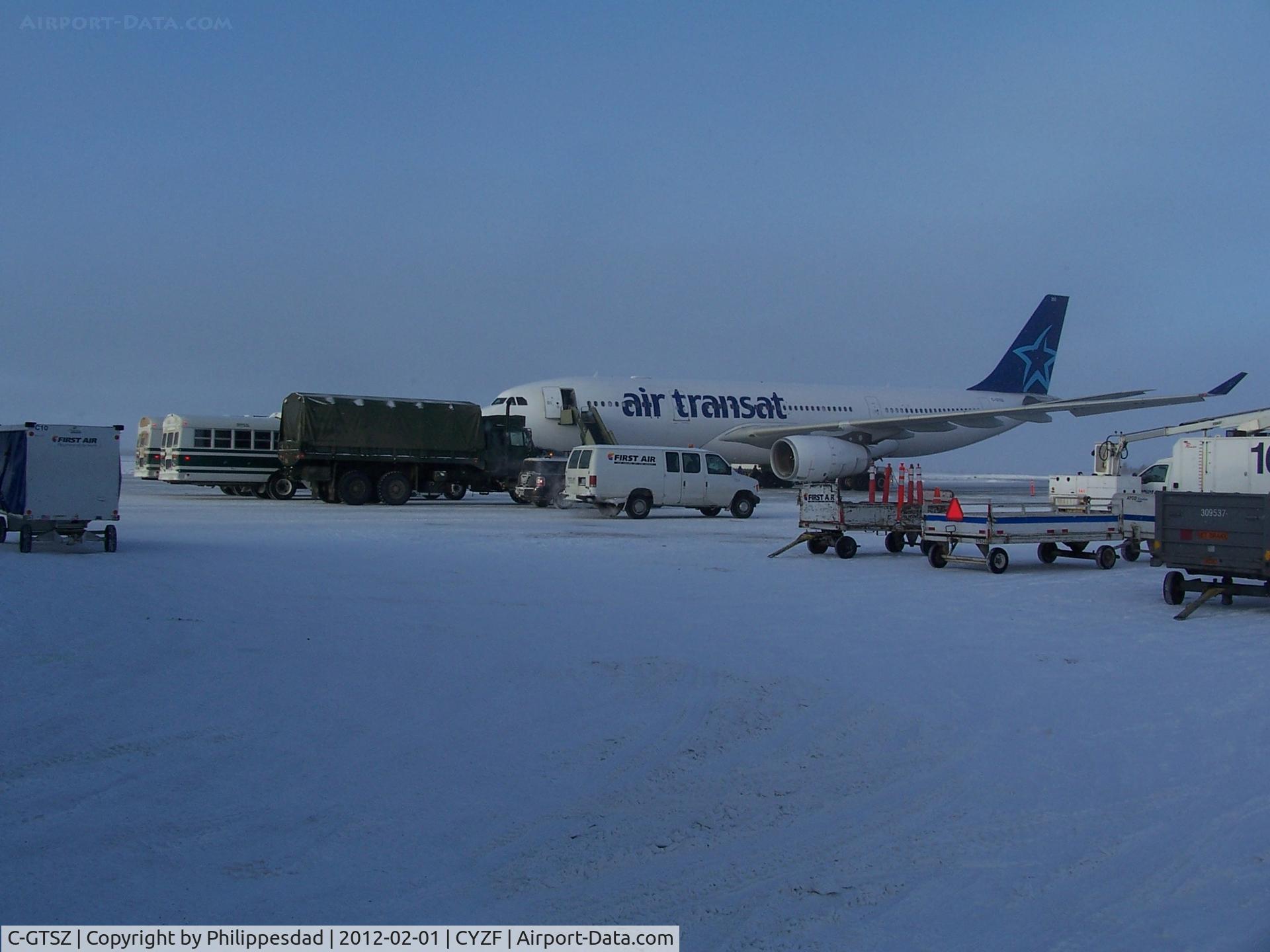 C-GTSZ, 2008 Airbus A330-243 C/N 971, Air Transat A330 at Yellowknife 2012 Feb 01 appears to be deployed by Canadian Armed Forces to deliver personnel for winter exercises.