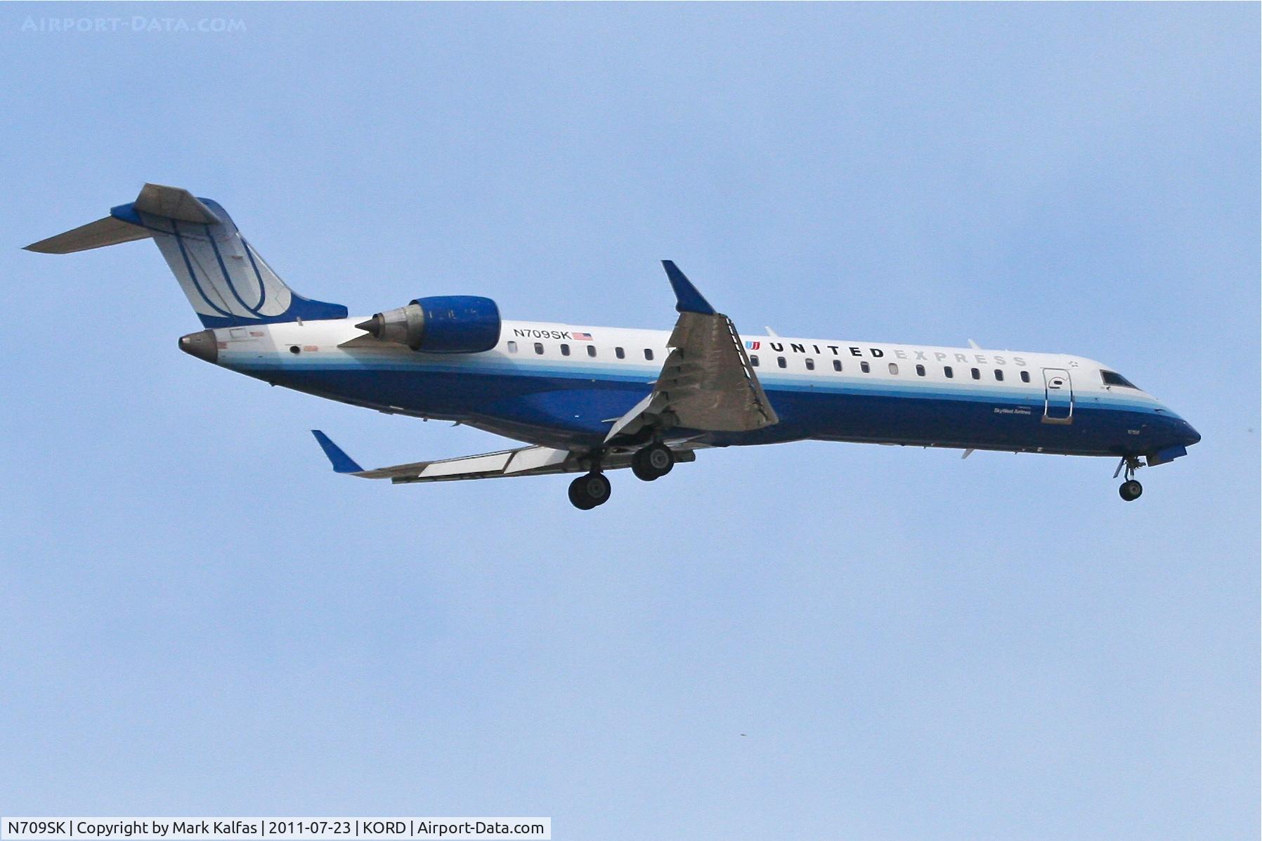 N709SK, 2004 Bombardier CRJ-701ER (CL-600-2C10) Regional Jet C/N 10159, SkyWest/United Express Bombardier CL-600-2C10 on approach RWY 10 KORD.