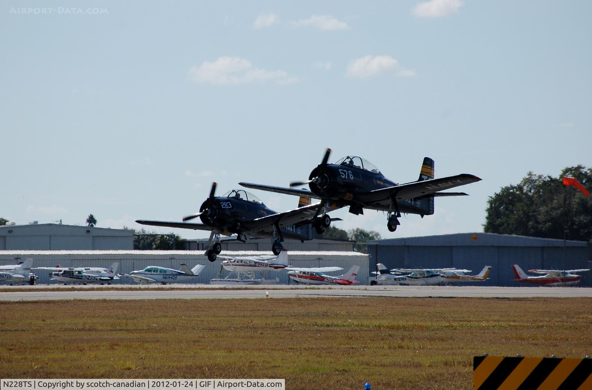 N228TS, 1954 North American T-28D Trojan C/N 200-422, 1954 North American NA-200 N228TS and 1955 North American T-28B N828JC at Gilbert Airport, Winter Haven, FL