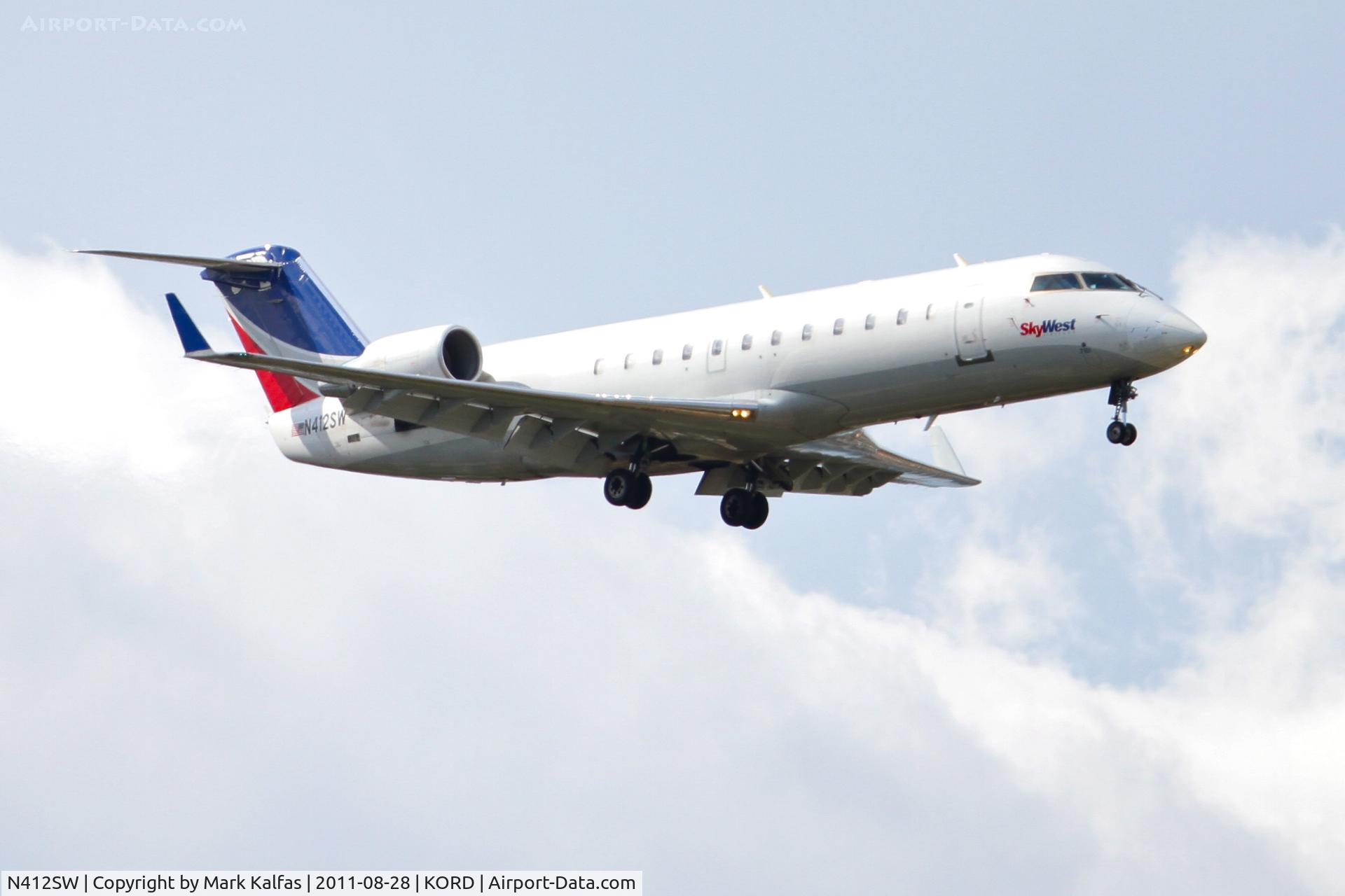 N412SW, 1995 Canadair CRJ-200ER (CL-600-2B19) C/N 7101, SkyWest Canadair CL-600-2B19 Regional Jet CRJ-200ER, N412SW RWY 10 approach KORD.
