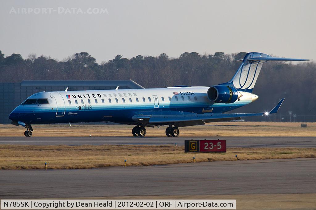 N785SK, 2009 Bombardier CRJ-700 (CL-600-2C10) Regional Jet C/N 10285, United Express (SkyWest Airlines) N785SK (FLT SKW5200) rolling out on RWY 5 after arrival from Houston Bush Intercontinental Airport (KIAH).