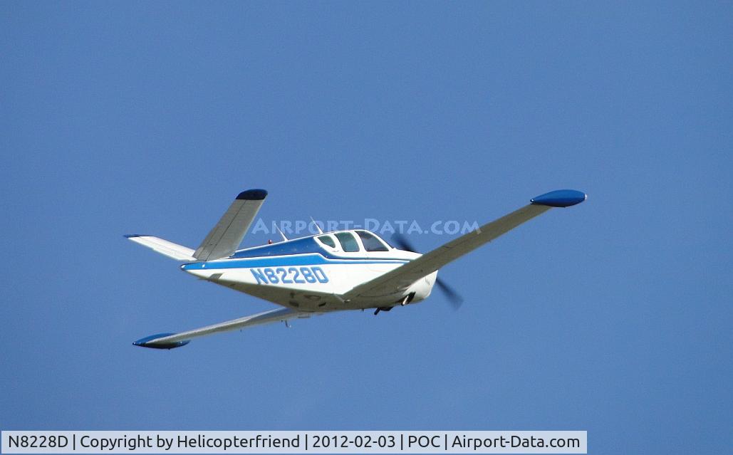 N8228D, 1957 Beech H35 Bonanza C/N D-5330, Climbing out after take off from runway 8R