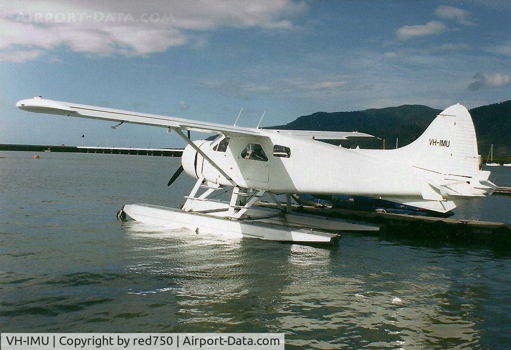 VH-IMU, 1961 De Havilland Canada DHC-2 C/N 1472, Photograph by Edwin van Opstal with permission. Scanned from a color print. Photo taken at Cairns  Seaplane base.