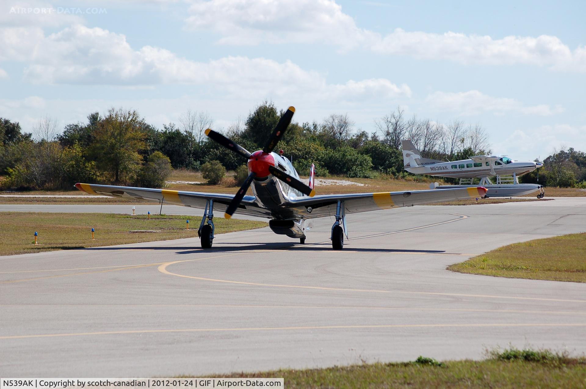 N539AK, Cessna 208 C/N 20800525, Cessna 208 N539AK and 1943 North American P-51C N251MX at Gilbert Airport, Winter Haven, FL