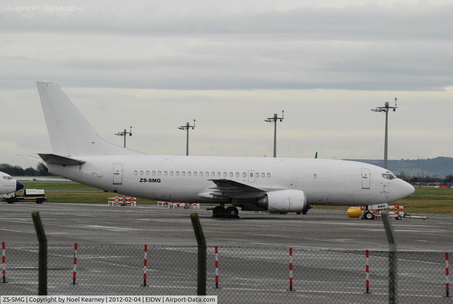 ZS-SMG, 1986 Boeing 737-3Y0/SF C/N 23499, Parked on a remote stand at Dublin during the day, and used for mail and cargo flights during the night,