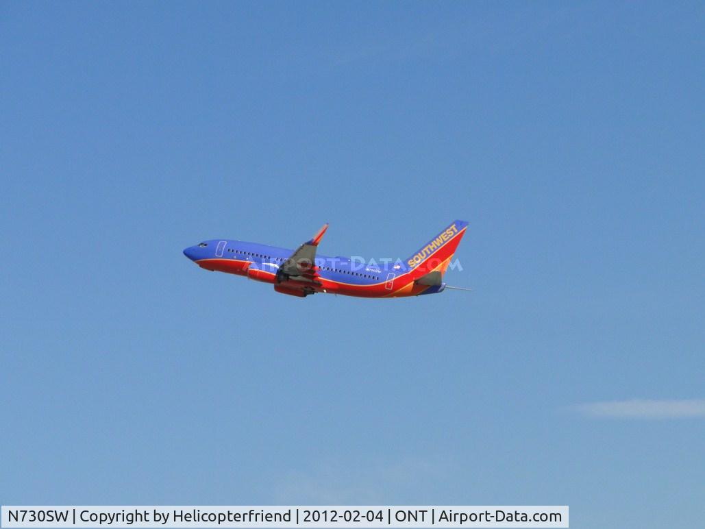 N730SW, 1999 Boeing 737-7H4 C/N 27862, Oakland, CA bound Flt 2120, climbing out after taking off from runway 26R