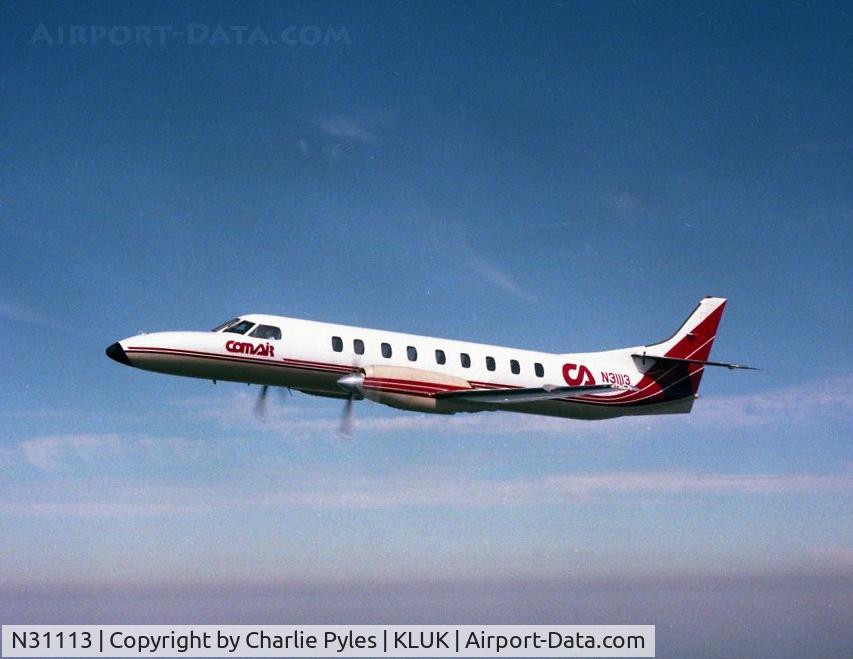 N31113, 1983 Fairchild Swearingen SA-227AC Metro III C/N AC-552, Air to Air with this Metro III from EMB 110 Bandeirante. 